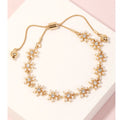 Junia Pearly Studded Flower Bracelet in Gold