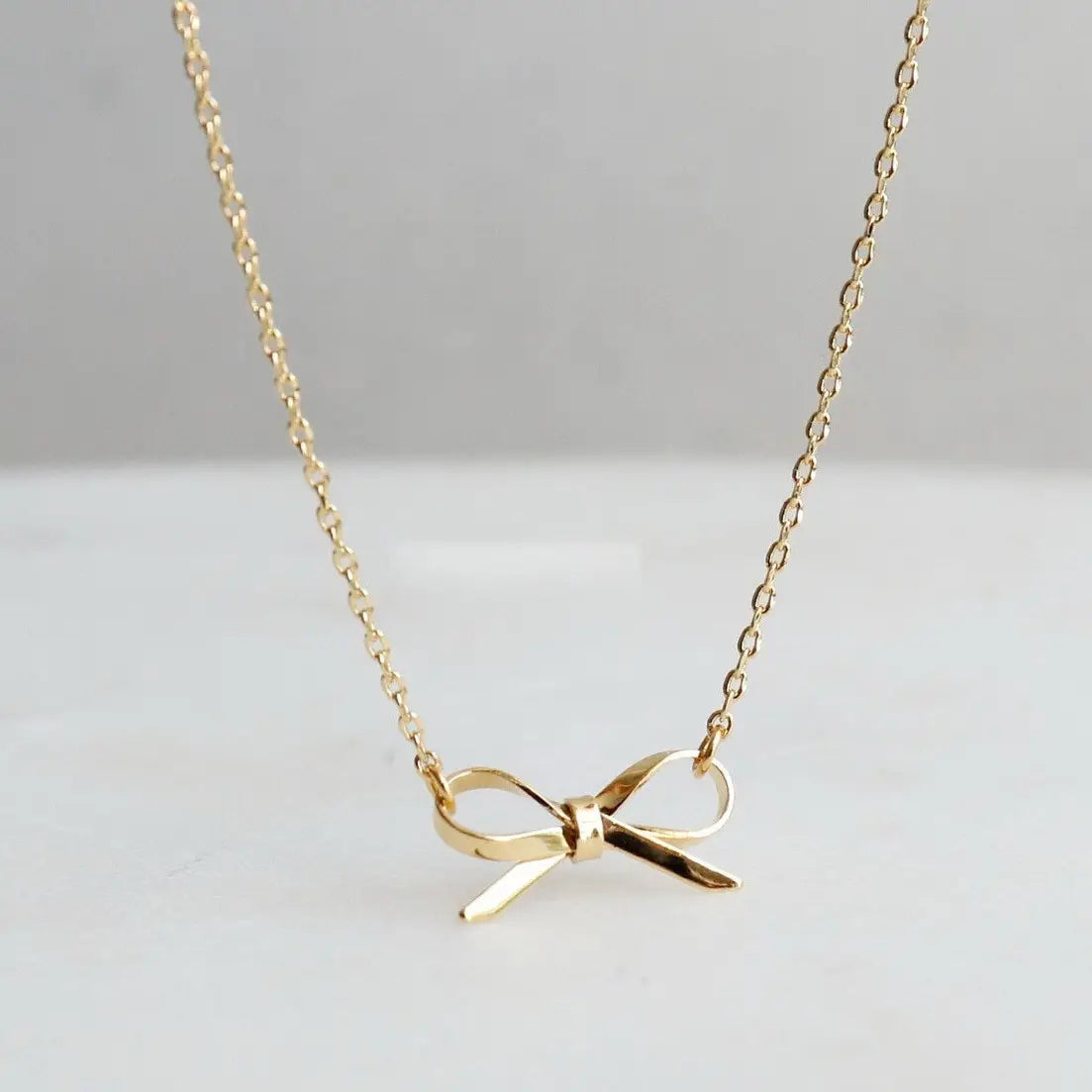Trinity Bow Necklace in Gold