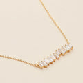 Nooriel Baguette Bar Necklace in Gold